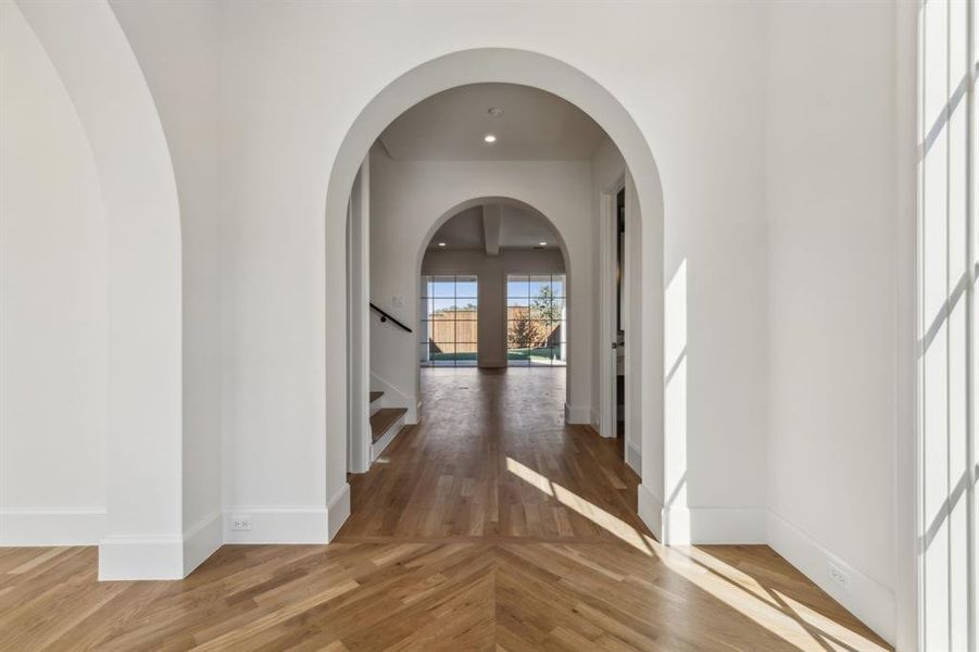 Hall featuring hardwood flooring