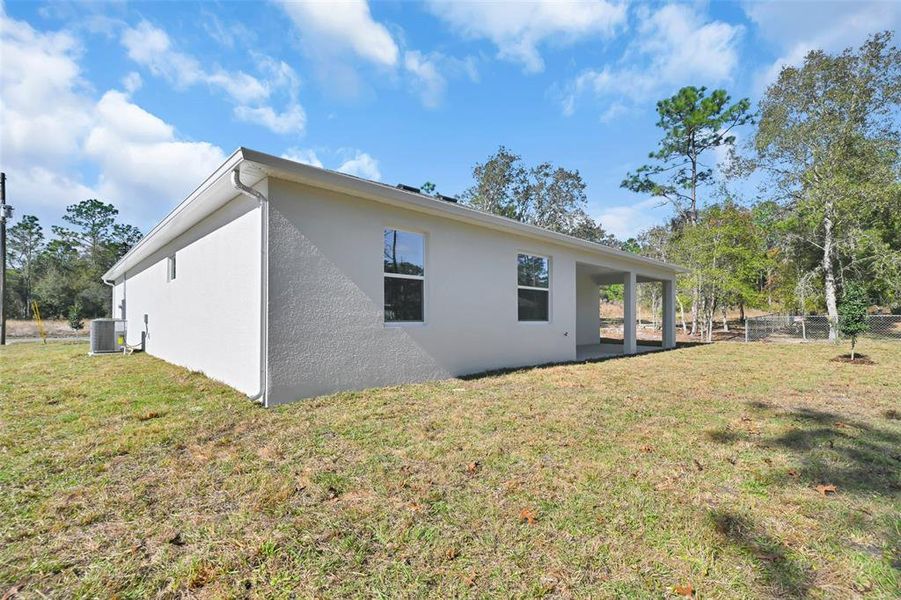 Exterior details and patio area of a home in , Citrus Springs (Image 4).