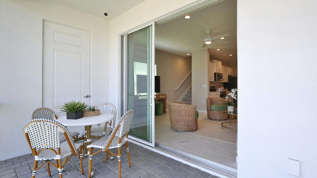 Exterior details and patio area of a home in Palm Grove Real Estate and Homes for Sale in Lakewood Ranch, FL - Neal Communities, Lakewood Ranch (Image 3).