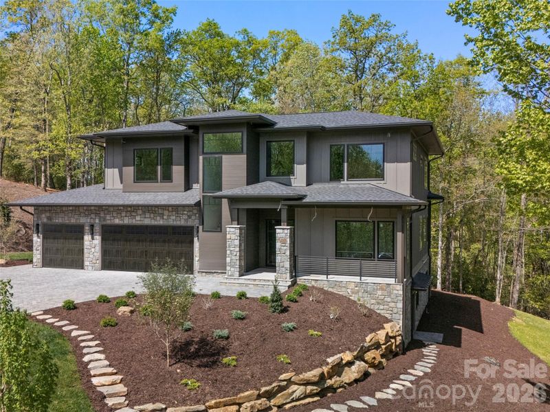 Front exterior of a new home in , Horse Shoe, NC, highlighting curb appeal (Image 11).