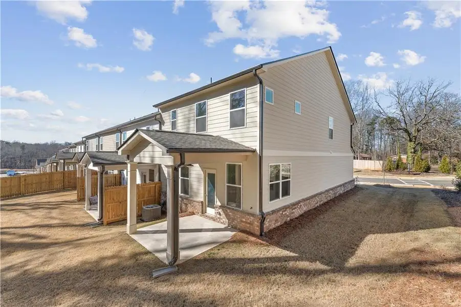 Exterior details and patio area of a home in Mulberry Summit, Flowery Branch (Image 2). Exterior details and patio area of a home in Mulberry Summit, Flowery Branch (Image 2).