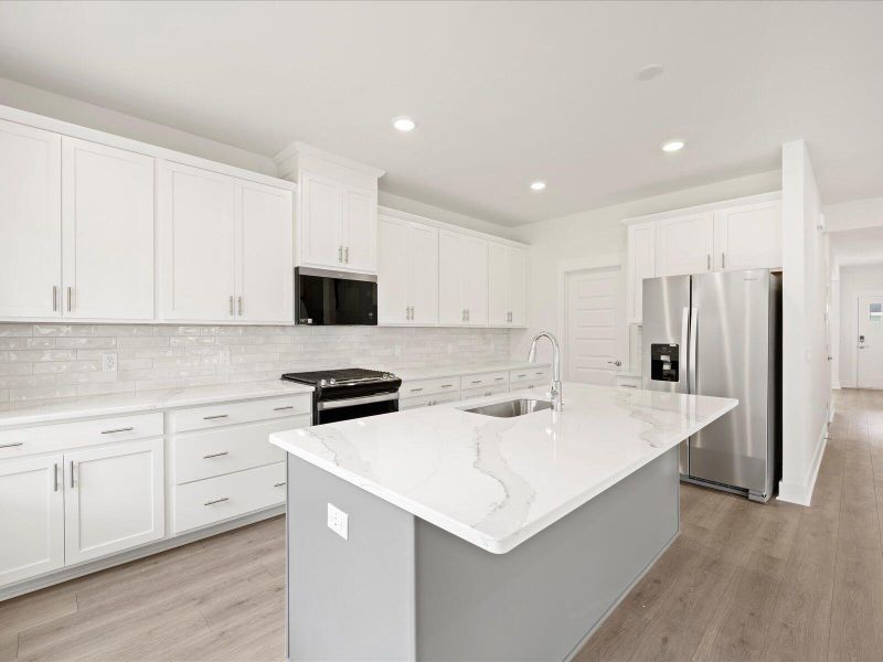 Furnished interior view inside a new home in The Coves at Lakes of Cane Bay, Summerville (Image 7).