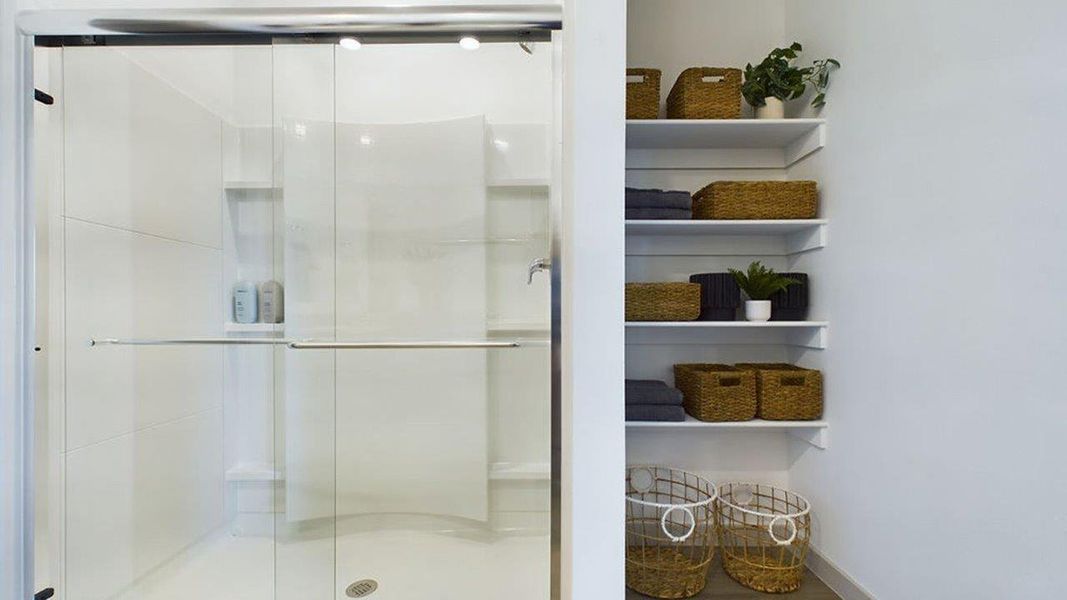 Representative furnished interior of a home built from the The Pierce by D.R. Horton in Overlook West, Wolfforth (Image 31).