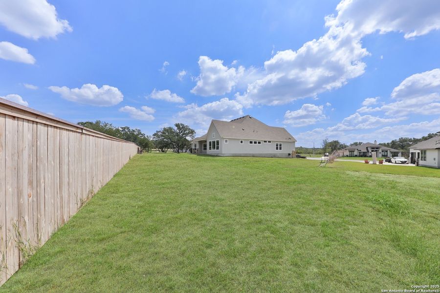 Front exterior of a new home in Megans Landing – Half-Acre Homesites, Castroville, TX, highlighting curb appeal (Image 19). Front exterior of a new home in Megans Landing – Half-Acre Homesites, Castroville, TX, highlighting curb appeal (Image 19).