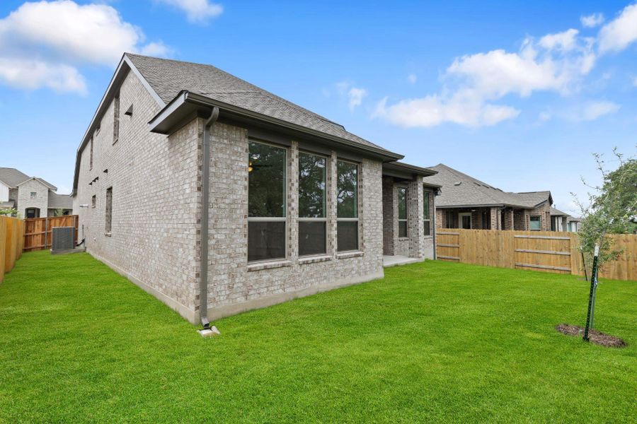 Rear of Home and Private Backyard