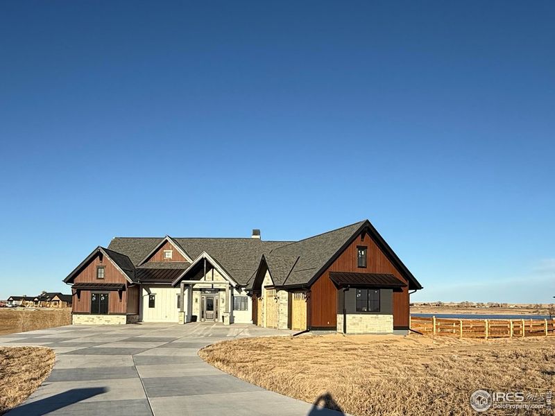 Front exterior of a new home in , Fort Collins, CO, highlighting curb appeal (Image 25).