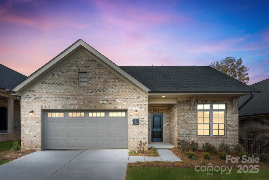 Front exterior of a new home in The Courtyards on New Hope, Gastonia, NC, highlighting curb appeal (Image 1).