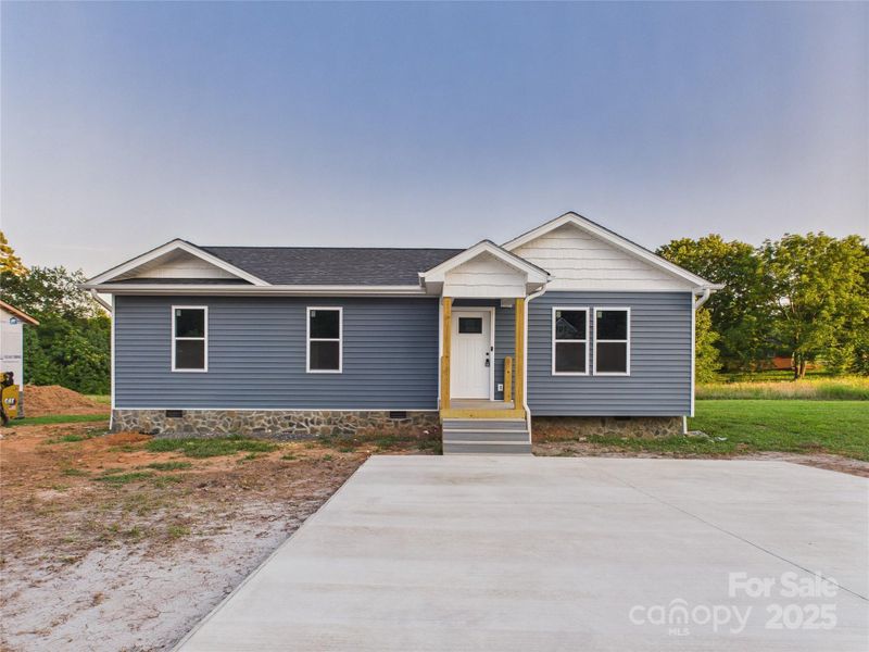 Front exterior of a new home in , Hudson, NC, highlighting curb appeal (Image 5). Front exterior of a new home in , Hudson, NC, highlighting curb appeal (Image 5).