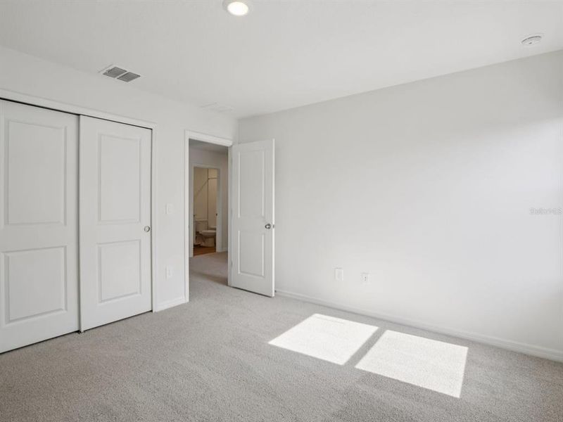 Spacious, unfurnished interior of a new home in Oakfield Trails - Premier Series, Parrish (Image 5).