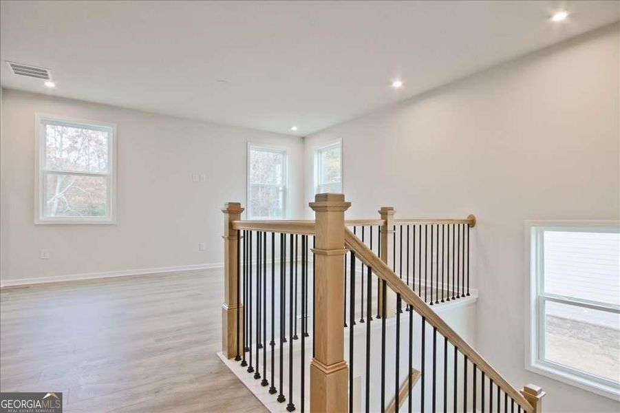 Spacious, unfurnished interior of a new home in The Paddocks at Doc Hughes, Buford (Image 24).