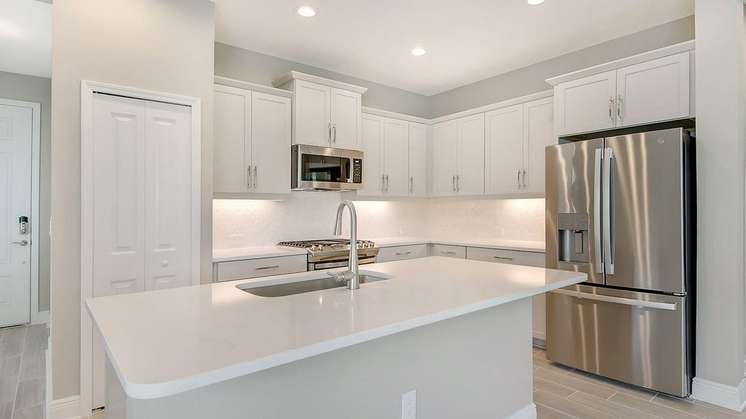 Furnished interior view inside a new home in Canoe Creek Real Estate and Homes for Sale in Parrish, FL - Neal Communities, Parrish (Image 4).