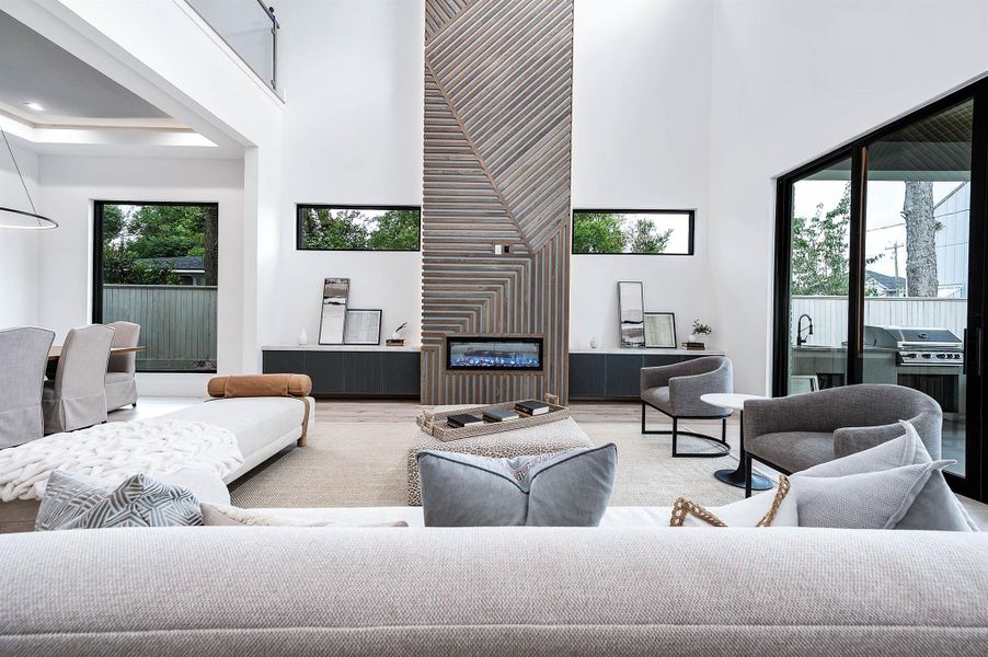 Large-format insulated black-framed picture windows throughout the home, enhancing natural light and modern style.