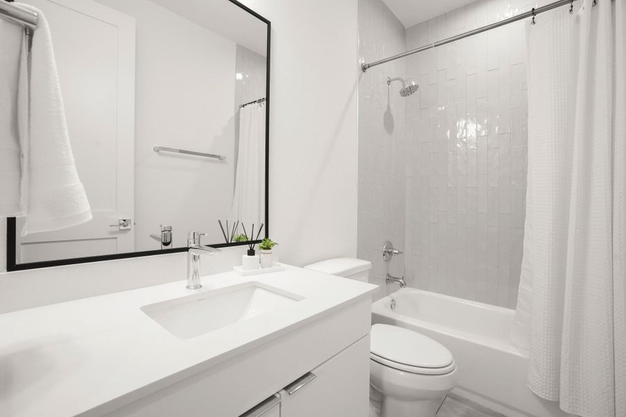 The full ensuite bathroom comes with tastefully selected modern finishes and a shower/tub combo with tiled backsplash. The full ensuite bathroom comes with tastefully selected modern finishes and a shower/tub combo with tiled backsplash.