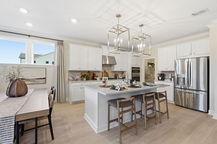 Representative furnished interior of a home built from the Essex by Taylor Morrison in Dreycott, Lawrenceville (Image 31).