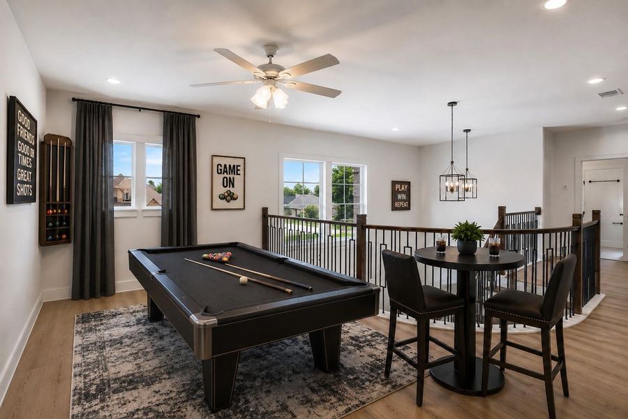 Virtually stage gameroom. Curtains are virtually staged to help buyers see all the possibilities.