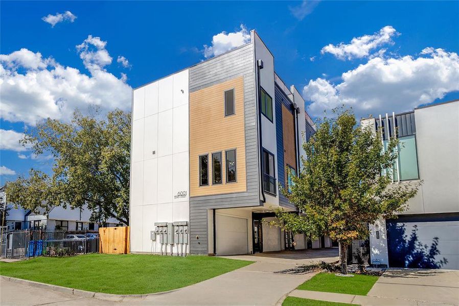 Modern home with a garage and concrete driveway