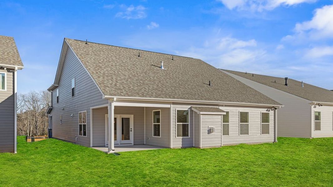 Exterior details and patio area of a home in Whitehawk Meadows, Travelers Rest (Image 3).