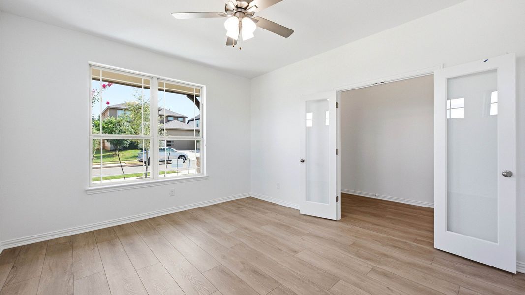 Furnished interior view inside a new home in Oaks at San Gabriel, Georgetown (Image 21).