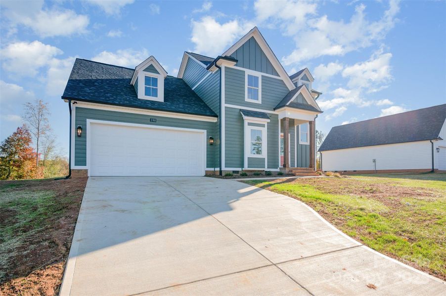 Front exterior of a new home in , China Grove, NC, highlighting curb appeal (Image 2).