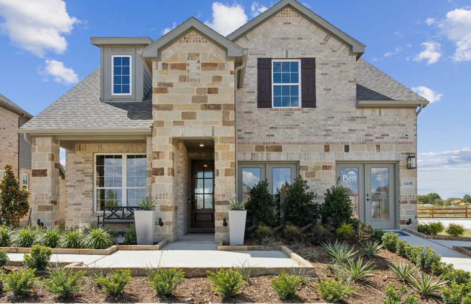 The Riverdale, a two-story home with 2-car garage