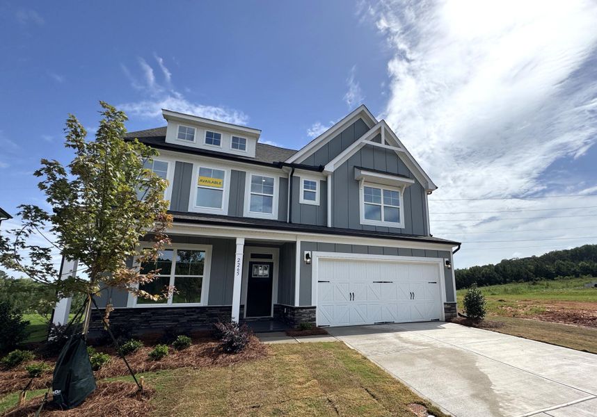 Front exterior of a new home in The Enclave at Laurelbrook, Sherrills Ford, NC, highlighting curb appeal (Image 2). Front exterior of a new home in The Enclave at Laurelbrook, Sherrills Ford, NC, highlighting curb appeal (Image 2).