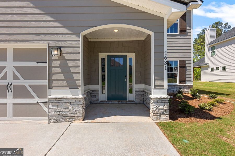 Exterior details and patio area of a home in Juliette Crossing, Forsyth (Image 36).