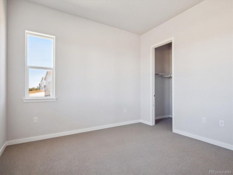 Spacious, unfurnished interior of a new home in Trails at Smoky Hill, Parker (Image 18).