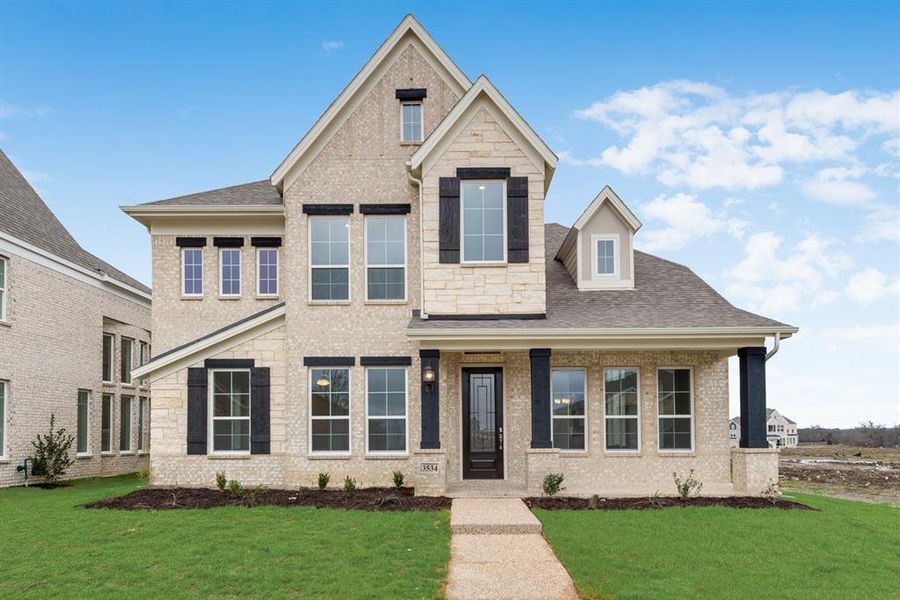 Front exterior of a new home in Prairie Ridge, Midlothian, TX, highlighting curb appeal (Image 2). Front exterior of a new home in Prairie Ridge, Midlothian, TX, highlighting curb appeal (Image 2).
