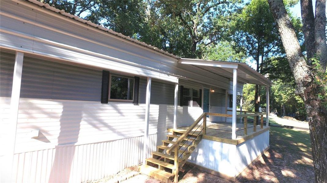 Front exterior of a new home in , Malakoff, TX, highlighting curb appeal (Image 2).