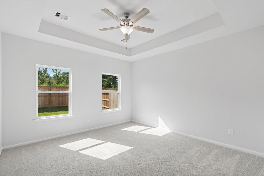 The Sparrow II- Primary Suite, Tray Ceiling not Included. Sample floor plan image for illustration; upgrades, options, and colors may vary.