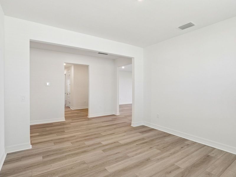 Spacious, unfurnished interior of a new home in Crescent Lakes - Signature Series, Punta Gorda (Image 15).