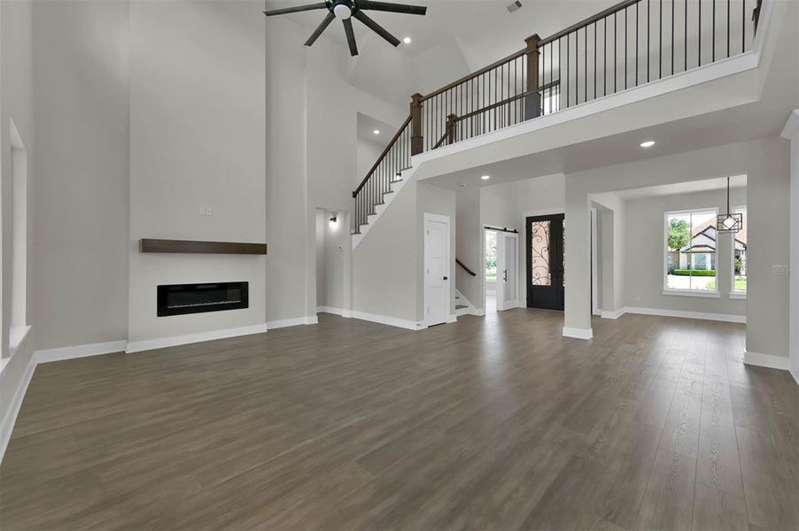 Similar Living Area with View of the Stairs in a Home Buil;t By TX Best Home Builders