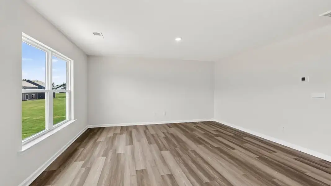 Spacious, unfurnished interior of a new home in Waverly Station, Greenwood (Image 27).