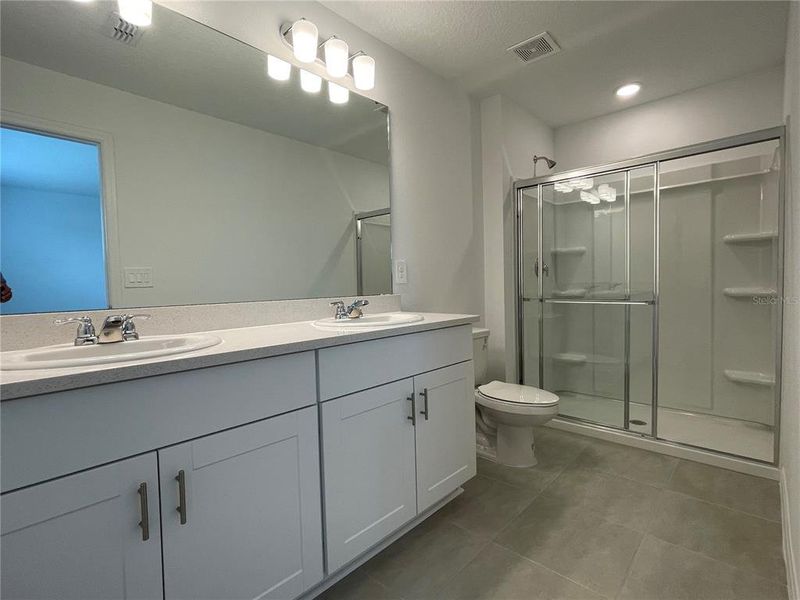 Furnished interior view inside a new home in Seasons at Big Sky, Kissimmee (Image 11).