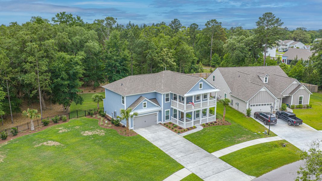 Front exterior of a new home in Sea Island Preserve, Johns Island, SC, highlighting curb appeal (Image 26).