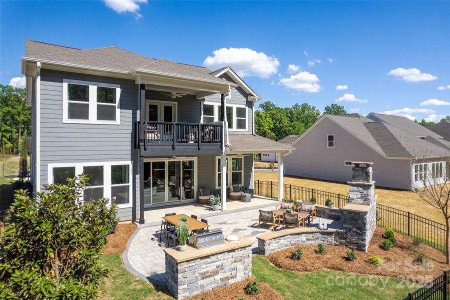 Exterior details and patio area of a home in North Creek Village, Huntersville (Image 3).
