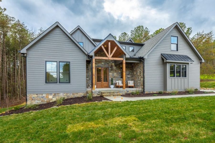 Exterior details and patio area of a home in River Gorge Ranch, Guild (Image 47).