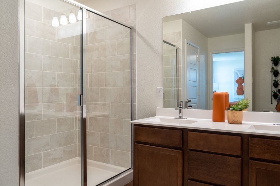 Shower with tile surround at primary bath