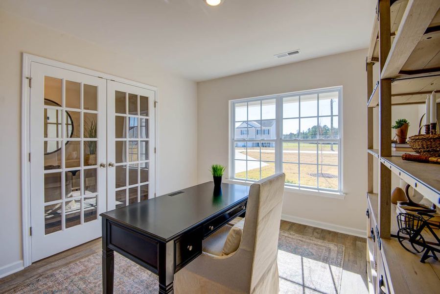 Representative furnished interior of a home built from the Penwell by D.R. Horton in Carter Ridge, Greenville (Image 10).