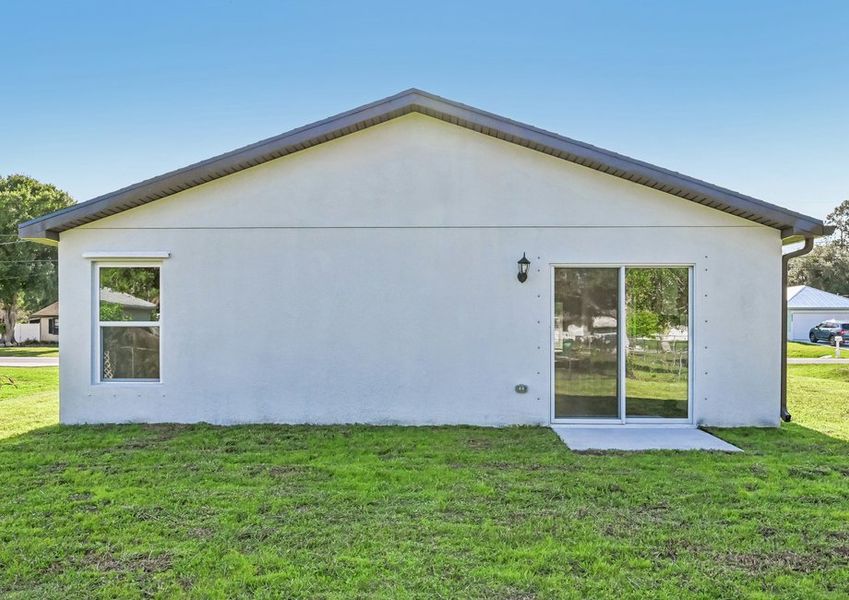The back yard is connected with glass sliding gdoors The back yard is connected with glass sliding gdoors