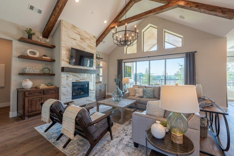 Grand living room with cathedral ceilings & beams