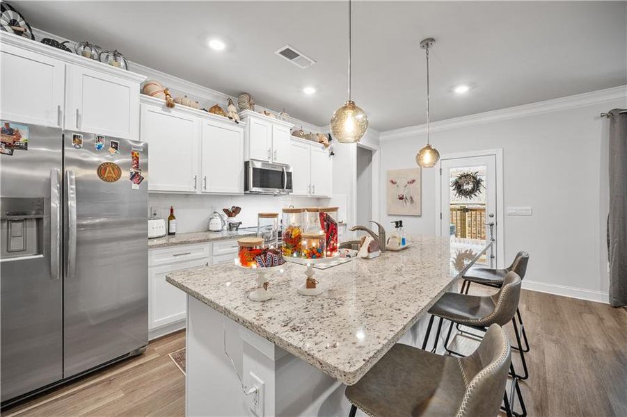 Furnished interior view inside a new home in Holiday Pines, Buford (Image 11).