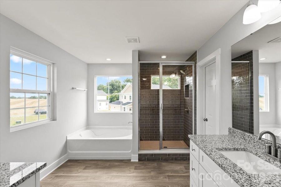 Furnished interior view inside a new home in , Monroe (Image 9).