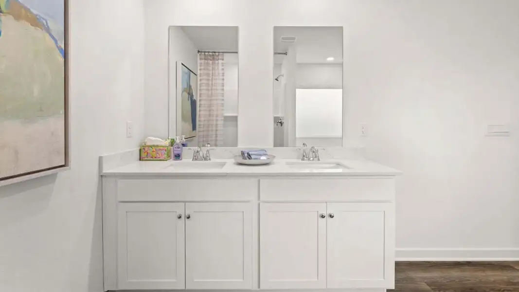 Furnished interior view inside a new home in Magnolia at the Bluffs Phase 3, Freeport (Image 23).