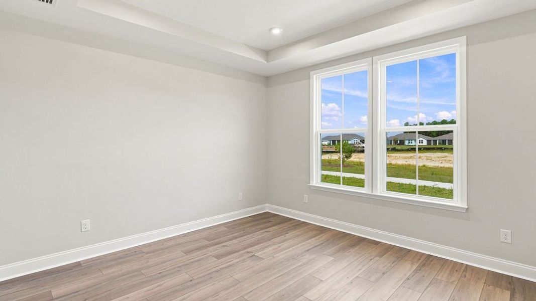 Spacious, unfurnished interior of a new home in Sun City Hilton Head, Bluffton (Image 32).