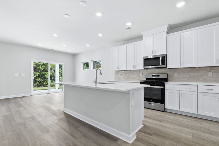 Furnished interior view inside a new home in Waterside - Coastline Series, Longs (Image 6).