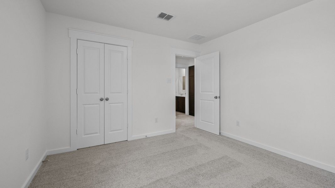 Furnished interior view inside a new home in Cielo, Conroe (Image 9).