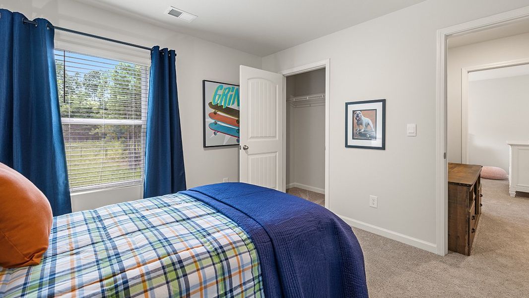 Representative furnished interior of a home built from the ROBIE by D.R. Horton in Pointe Park, Union City (Image 42).