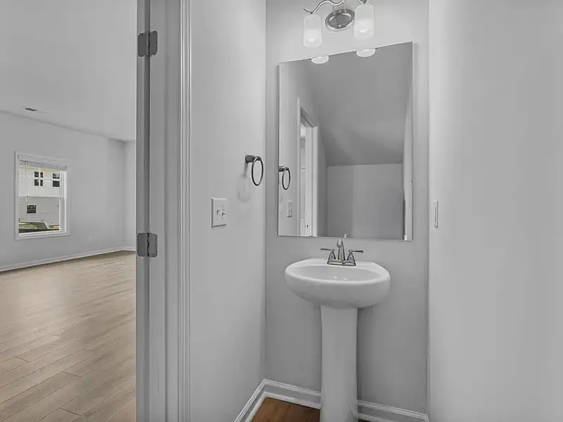 Furnished interior view inside a new home in Percival Village, Columbia (Image 5).