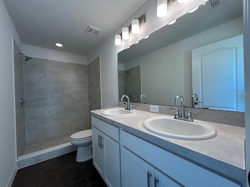 Furnished interior in a model home at James Farms in Bartow (Image 23).